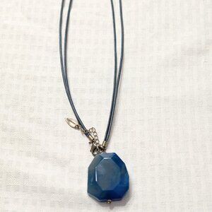 Gem necklace with leather cord.